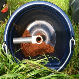 soil buildup inside the client’s tee-bar style pipe in the unit